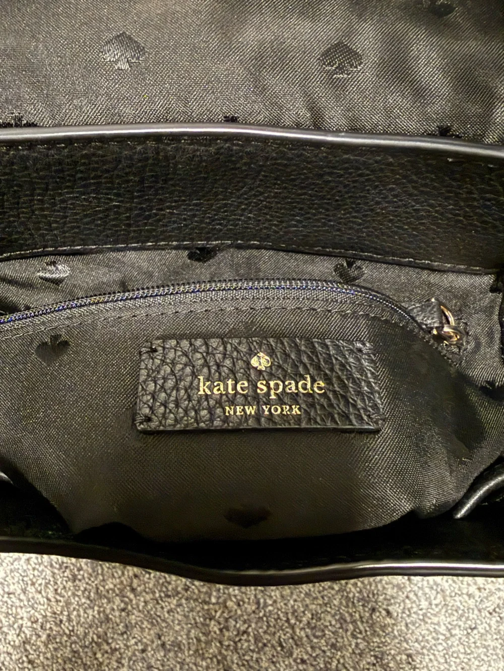 Kate Spade New York Black Pebbled Leather Flap Backpack
